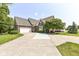 Beautiful brick home featuring an attached garage and screened-in porch at 10844 Fairwoods Dr, Fishers, IN 46037