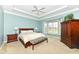 Spacious main bedroom with a bay window and tray ceiling at 10844 Fairwoods Dr, Fishers, IN 46037
