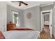 Inviting bedroom with hardwood floors, featuring stylish decor and a relaxing atmosphere at 112 S Spencer Ave, Indianapolis, IN 46219