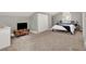 Large bedroom with carpet, featuring ample space, great lighting, and a cozy feel at 112 S Spencer Ave, Indianapolis, IN 46219