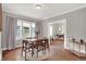 Dining room featuring hardwood floors and natural light at 112 S Spencer Ave, Indianapolis, IN 46219