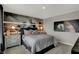 Inviting bedroom featuring a football theme, complemented by sporty decor and a comfortable bed at 11599 Aubrey Ln, Fishers, IN 46040