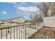 A back porch overlooking the street and neighborhood, with hanging decorative lights at 12683 White Chapel Cir, Fishers, IN 46037
