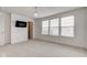 Well-lit bedroom featuring a chandelier and large windows for natural light at 12683 White Chapel Cir, Fishers, IN 46037