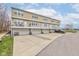 Three-story townhouse with garage parking below and individual deck on the main level at 12683 White Chapel Cir, Fishers, IN 46037