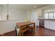 Eat-in kitchen with stainless steel appliances and dining table at 12683 White Chapel Cir, Fishers, IN 46037
