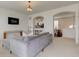 Spacious living room with neutral tones and an open layout to the kitchen at 12683 White Chapel Cir, Fishers, IN 46037