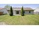 The house backyard features a patio, ample green space, and mature landscaping, perfect for outdoor enjoyment at 12741 Glengary Dr, Fishers, IN 46038