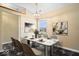This dining room features stylish decor, a modern light fixture, and an elegant marble table at 12741 Glengary Dr, Fishers, IN 46038