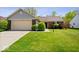 Lovely single-story home featuring an attached garage and a lush, green front lawn at 12741 Glengary Dr, Fishers, IN 46038