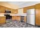 Functional kitchen features stainless appliances, sleek countertops, and ample cabinet space at 12741 Glengary Dr, Fishers, IN 46038