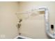 The laundry room features connections for a washer and dryer, along with convenient shelving at 12741 Glengary Dr, Fishers, IN 46038