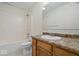Bathroom featuring a shower/tub combo, vinyl floor, and wood vanity at 12949 Shandon Ln, Fishers, IN 46038