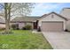 Charming single story home with a well-manicured lawn and attached two car garage at 12949 Shandon Ln, Fishers, IN 46038