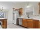 Well-equipped kitchen features stainless steel appliances and connects to a bright dining area at 12949 Shandon Ln, Fishers, IN 46038