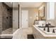 Bright bathroom featuring a walk-in shower, a tub, granite countertops, and neutral colors at 14910 Briarpatch Cir, Carmel, IN 46033