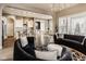 Spacious open-concept living area seamlessly connecting the kitchen, dining, and seating areas at 14910 Briarpatch Cir, Carmel, IN 46033