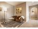 Cozy loft area featuring neutral-toned walls, plush seating, carpet, and decor at 14910 Briarpatch Cir, Carmel, IN 46033