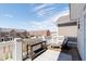 Bright and airy balcony with outdoor furniture and scenic neighborhood views at 15391 Mystic Rock Dr, Carmel, IN 46033