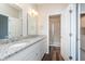 Bright bathroom features granite counters, double sinks and glass enclosed shower at 15391 Mystic Rock Dr, Carmel, IN 46033