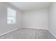 Neutral bedroom offers cozy carpet, a window, and neutral paint at 15391 Mystic Rock Dr, Carmel, IN 46033