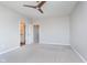 Neutral bedroom with carpet flooring and attached bathroom at 15391 Mystic Rock Dr, Carmel, IN 46033