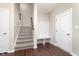 Convenient mudroom with a bench and hooks, providing organized storage and functionality at 15391 Mystic Rock Dr, Carmel, IN 46033