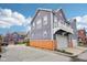 New construction exterior elevation shows a multi-story home with garage and private balcony at 1557 N College Ave # 3, Indianapolis, IN 46202
