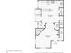 Detailed floor plan showcasing the layout of the home, including the kitchen, living room, and covered patio at 1557 N College Ave # 3, Indianapolis, IN 46202