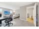 Large main bedroom offers a TV, workspace, and an ensuite bathroom at 1557 N College Ave # 3, Indianapolis, IN 46202