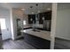 Kitchen featuring an island, modern lighting, and sleek countertops perfect for entertaining at 1711 Ringgold Ave, Indianapolis, IN 46203