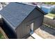 Aerial view of the modern outbuilding with black siding and new roof shingles at 1711 Ringgold Ave, Indianapolis, IN 46203