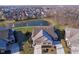 Aerial view of a home with pond and fountain at 17346 Haxby Ln, Westfield, IN 46074