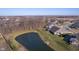 Overhead view featuring a home and a beautiful pond at 17346 Haxby Ln, Westfield, IN 46074