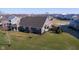 Overhead view showcasing the home's spacious yard and pond at 17346 Haxby Ln, Westfield, IN 46074