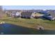 Aerial view of backyard pond and home at 17346 Haxby Ln, Westfield, IN 46074