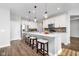 Spacious kitchen showcases a large island, modern appliances, and seamless flow for entertaining and cooking at 17346 Haxby Ln, Westfield, IN 46074