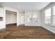 Inviting living space filled with natural light, gleaming hardwood floors and fresh, neutral paint at 17346 Haxby Ln, Westfield, IN 46074