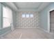 This expansive main bedroom boasts a trey ceiling, and multiple windows, offering abundant natural light and serene views at 17346 Haxby Ln, Westfield, IN 46074