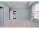 Spacious main bedroom featuring a barn door leading to the bathroom and ample natural light, offering modern comfort at 17346 Haxby Ln, Westfield, IN 46074
