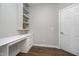 The home office offers a custom built-in desk and shelving, perfect for remote work or study at 17346 Haxby Ln, Westfield, IN 46074