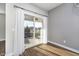 Sliding glass doors open to the patio and backyard, seamlessly connecting indoor and outdoor living spaces at 17346 Haxby Ln, Westfield, IN 46074