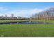 Beautiful pond with a well-maintained green lawn at 17346 Haxby Ln, Westfield, IN 46074
