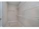 The walk-in closet has built-in shelving and ample storage space, offering a perfect organization solution at 17346 Haxby Ln, Westfield, IN 46074