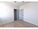 This bedroom has wood floors, two doors and a closet at 2053 Columbia Ave, Indianapolis, IN 46202