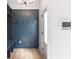 Mudroom features custom built-ins, hooks, bench, and door to the exterior at 2053 Columbia Ave, Indianapolis, IN 46202