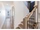 Bright staircase with natural wood treads and black metal railings at 2053 Columbia Ave, Indianapolis, IN 46202