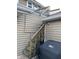 An image of a backyard including a staircase to an upper deck and a Weber grill at 212 Walnut St, Greenfield, IN 46140