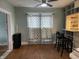 Open dining space features built in bar area, a window and modern decor at 212 Walnut St, Greenfield, IN 46140