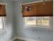 Bright room featuring windows with blinds at 212 Walnut St, Greenfield, IN 46140